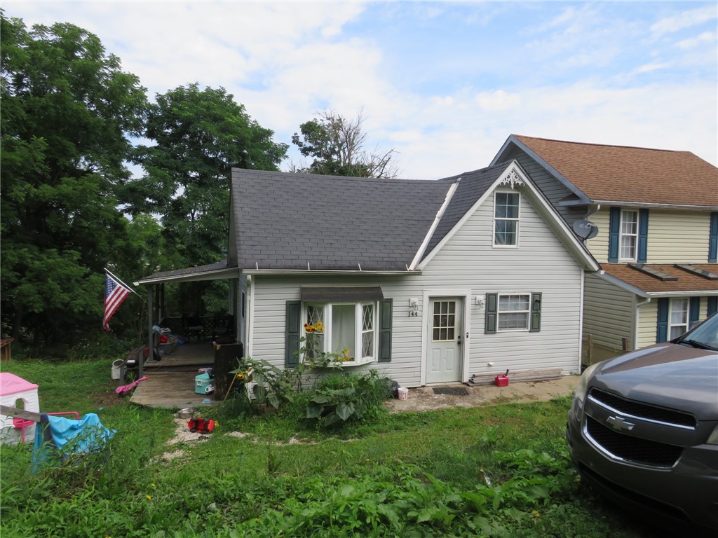 144 Armstrong Ave — photo 1