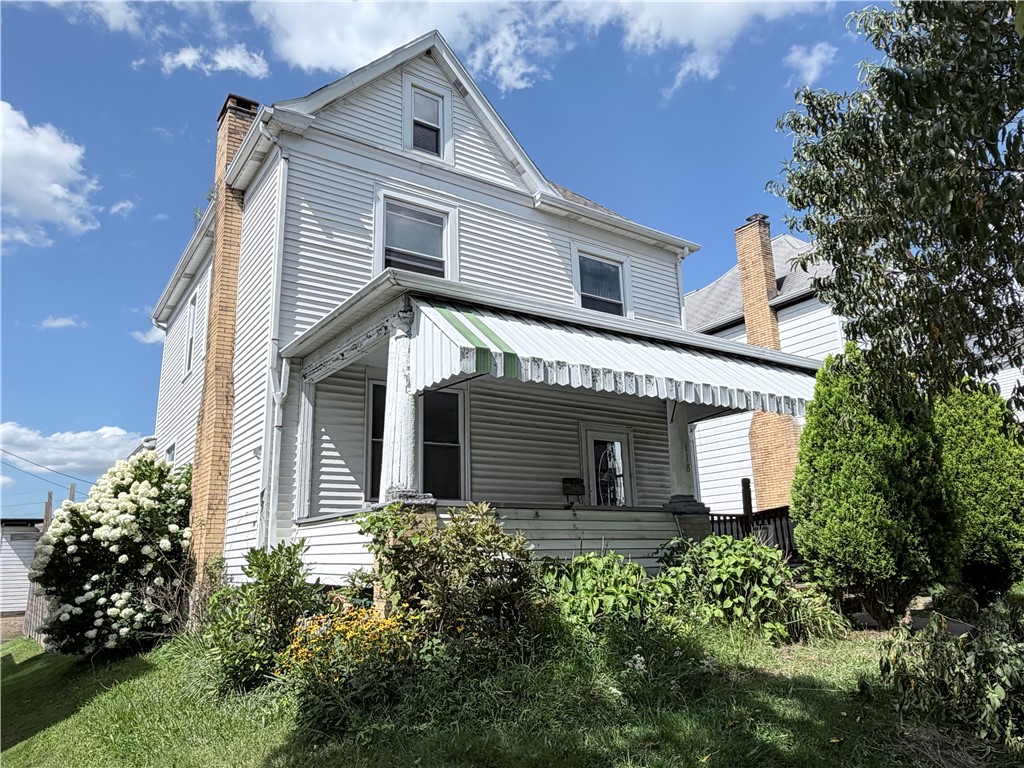 118 W Adams Ave — photo 1