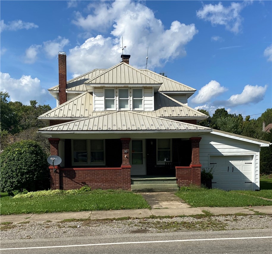 313 E Main St — photo 1
