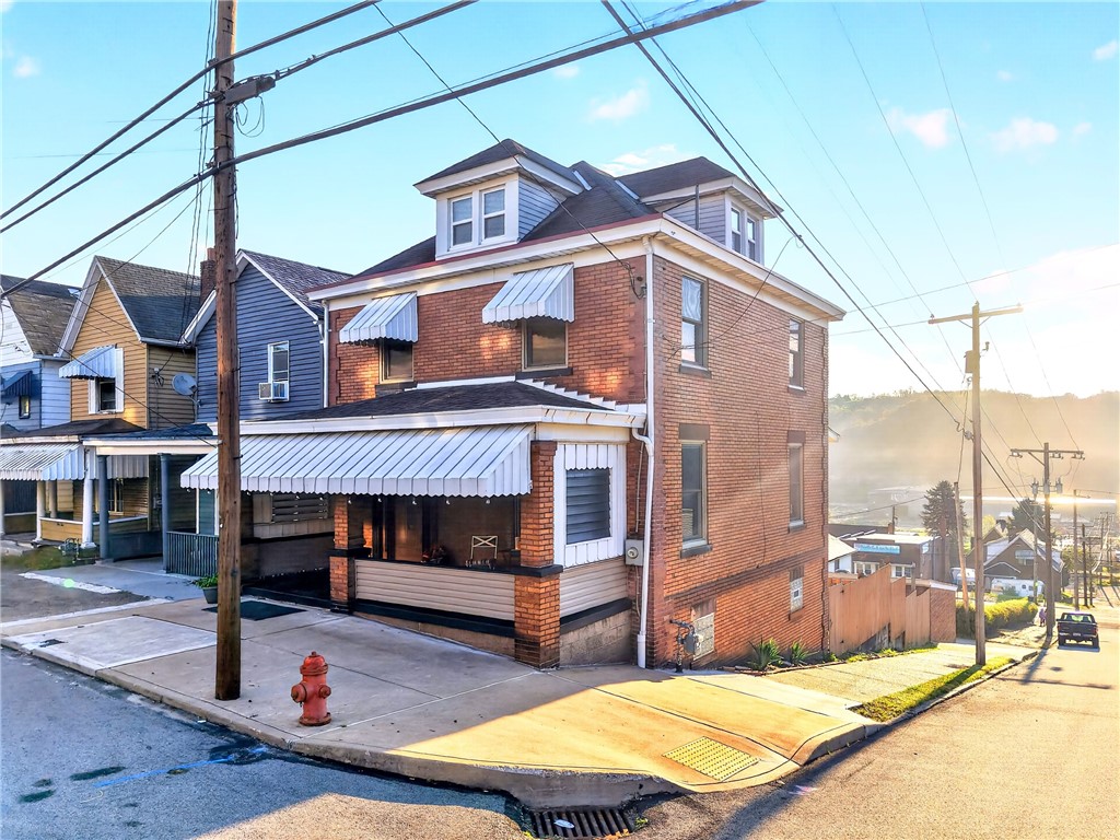 100 Thompson Ave — photo 1