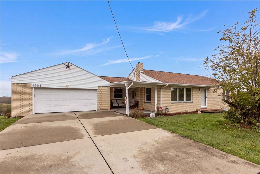 1528 Millers Run Rd — photo 1